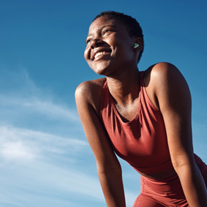 Lady smiles outdoors