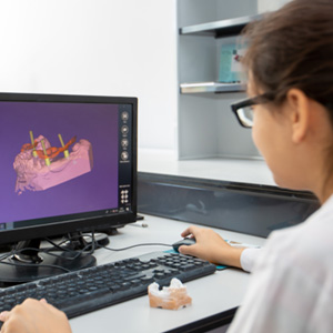 Using computer to plan dental implant placement